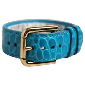 Dolce & Gabbana Bracelete de cinto em couro azul com relevo e fivela dourada