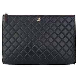 Chanel Clutch classica in pelle di agnello oro Large