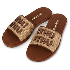 Miu Miu Slides aus gewebtem Stoff Braun