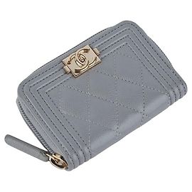 Chanel Porte-cartes zippé Boy Caviar Gold