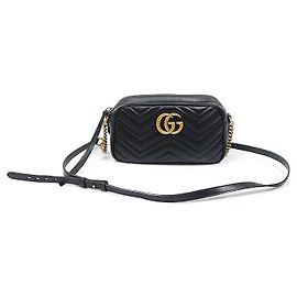 Gucci Pequena mala de ombro com corrente GG Marmont em matelassé chevron preto