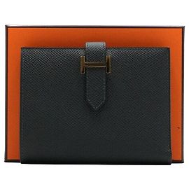 Hermès Cartera compacta con herrajes en oro amarillo