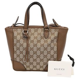 Gucci Borsa a spalla tote piccola in tela GG Supreme brown