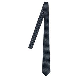 Cravatta Gucci in seta blu con motivo jacquard GG