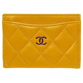 Chanel Tarjetero cartera de piel caviar amarilla