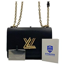 Louis Vuitton Borsa a tracolla Twist MM in pelle Epi con catena dorata Borsa crossbody Nera