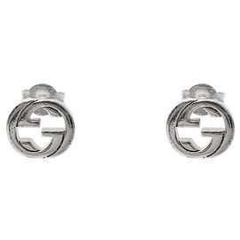 Gucci Pendientes entrelazados de plata