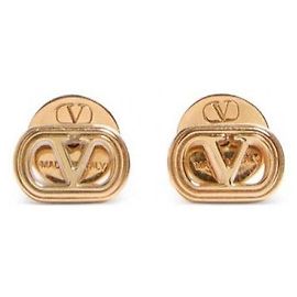 Boucles d'oreilles ovales Valentino en métal doré