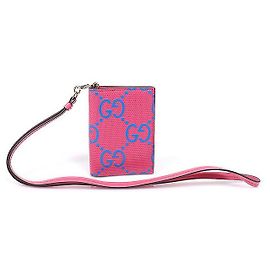 Gucci Portacarte in pelle embossed GG rosa con cordino da collo