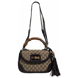 Gucci Borsa Tote a spalla con manico in bambù e nappe in jacquard logo GG Marrone