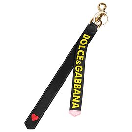 Dolce & Gabbana Schlüsselanhänger aus Leder mit Messinghalter Logo Schwarz und Gelb