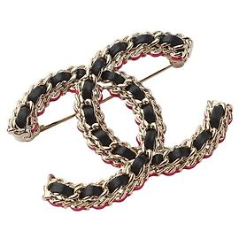 Chanel CC Brosche aus Kalbsleder und Metall Gold Schwarz Rosa