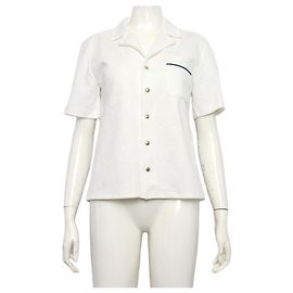 Céline Polo in piqué da donna Triope con bottoni dorati
