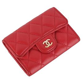 Chanel Tarjetero con solapa Classic Gold de Caviar