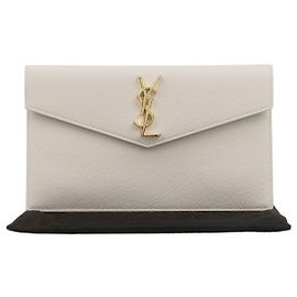Autre Marque Clutch da donna in pelle crema con monogramma impresso