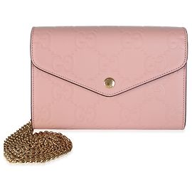Portafoglio a catena Gucci in pelle di vitello Rose con logo GG impresso