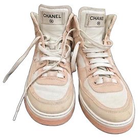 Chanel High-Top-Sneaker aus Leder und Canvas in Rosa und Weiß