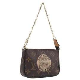 Louis Vuitton Pochette Accessoires Limited Edition Monogram Canvas Mini