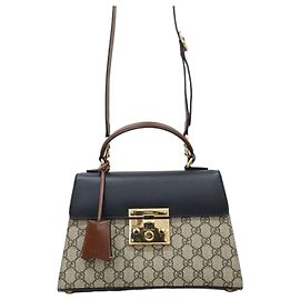 Gucci Borsa a mano e a tracolla GG Supreme con lucchetto