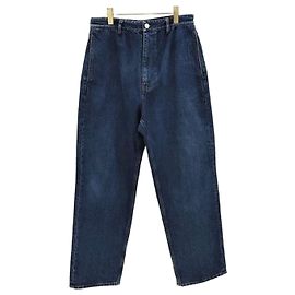 Balenciaga Pantaloni in denim oversize con logo sulla linguetta in vita