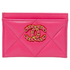 Chanel Tarjetero y cartera de piel rosa