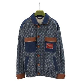 Gucci Gewaschene Bio-Denim-Jacke mit braunen Lederbesätzen