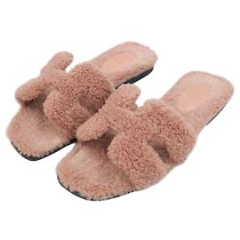 Hermès Slippers Oran in shearling