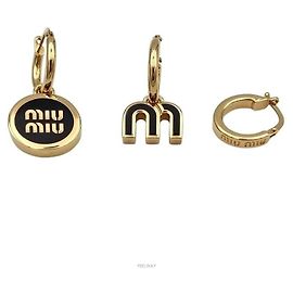 Miu Miu Set de pendientes chapados en oro