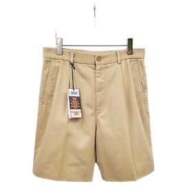 Gucci Pantaloncini beige con patch logo ananas