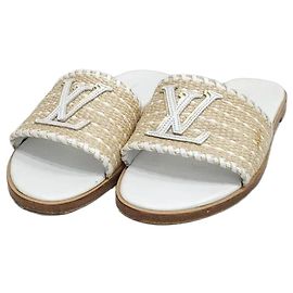 Louis Vuitton Sandali e ciabatte in rafia Monogram