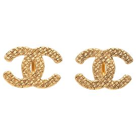 Orecchini a clip Chanel CC intrecciati placcati oro