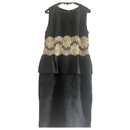 Dolce & Gabbana Peplum-Kleid aus schwarzer Spitze