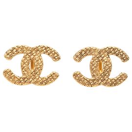 Orecchini a clip Chanel CC intrecciati placcati oro Gold