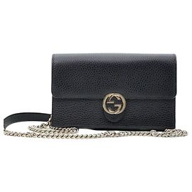 Gucci WOC Crossbody-Tasche aus schwarzem Leder mit ineinandergreifendem GG und goldfarbener Kette