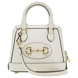 Gucci Mini borsa a mano in pelle bianca con morsetto