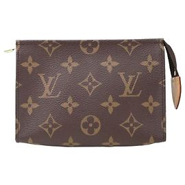 Louis Vuitton Pochette de toilette en toile Monogram