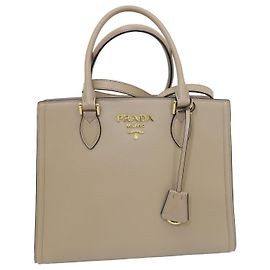 Prada Nova mala tote bege com logótipo dourado