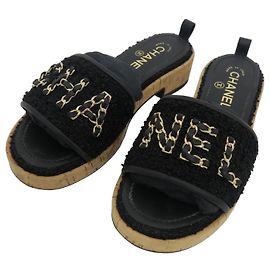 Chanel Pantofole in tweed nero con lettere