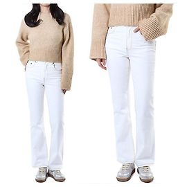 Tory Burch Vaqueros blancos cropped flare con costuras amarillas