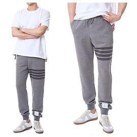 Thom Browne Pantaloni da allenamento con dettagli nastro Three-Stripe e fascia Four-Stripe