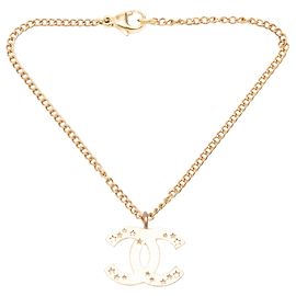 Collana con pendente Chanel CC placcato oro con intaglio a stella