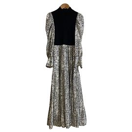 Autre Marque Vestido plisado floral con chaleco de punto Snidel