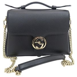 Gucci Borsa Tote piccola a tracolla in pelle nera con logo GG intrecciato e catena