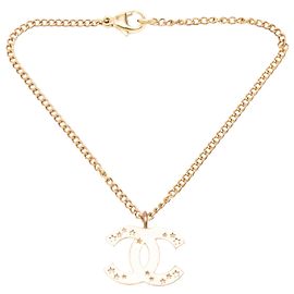 Collana con pendente Chanel Gold CC placcato oro con intaglio a stella