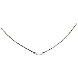 Tiffany & Co Collana con mini pendente Smile in oro giallo e diamanti