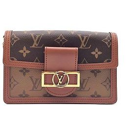 Louis Vuitton Portafoglio con catena Dolphin Monogram