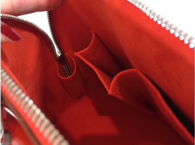 Louis Vuitton Alma PM Naranja - vista 12