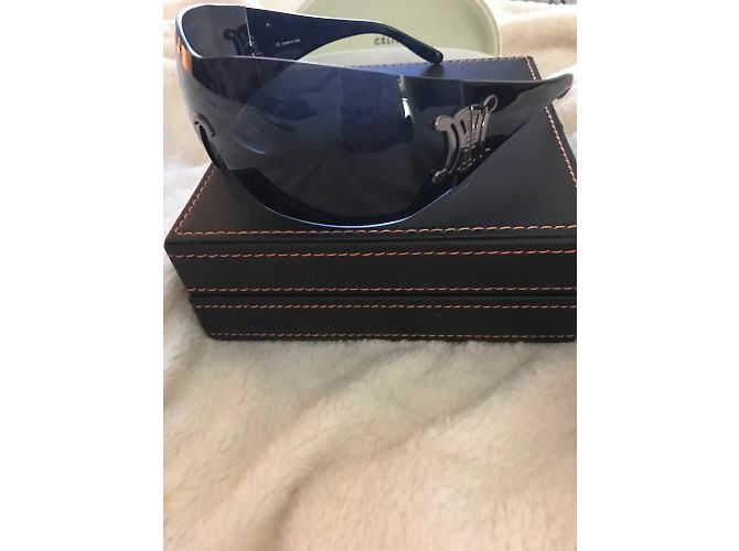 Lunettes de soleil Céline noires en plastique - vue 5