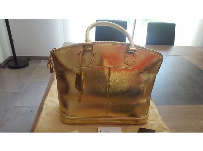 Louis Vuitton Lockit MM Suhali Borsa a mano in pelle di capra oro metallizzato D'oro Metallico - vista 13