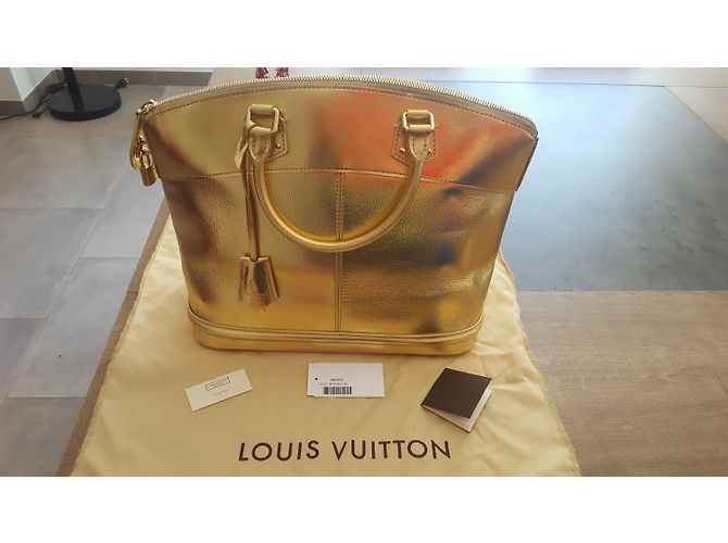 Louis Vuitton Lockit MM Suhali Borsa a mano in pelle di capra oro metallizzato D'oro Metallico - vista 16